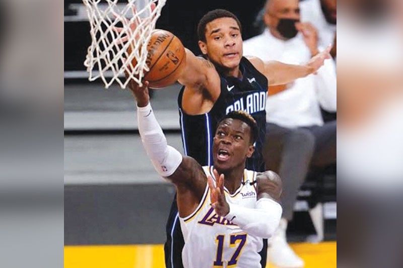 Lakers lusot sa Magic