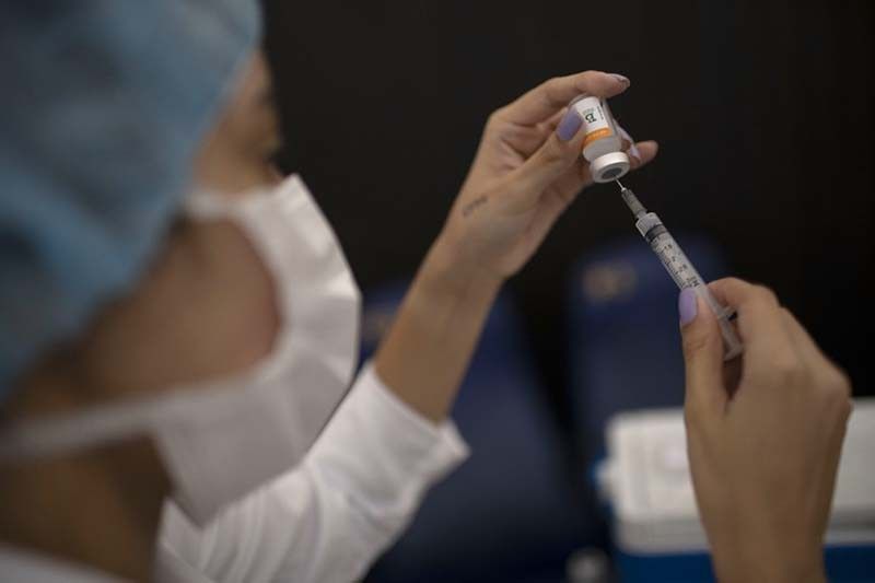 China vaccine maker Sinovac says doubles production capacity