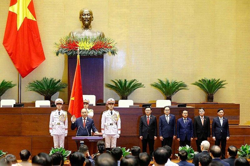 Vietnam's pandemic response leader sworn in as president