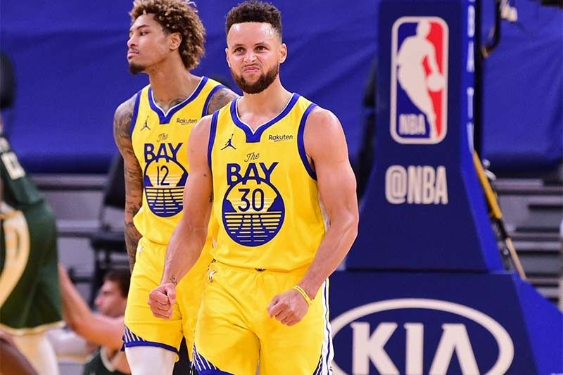 Curry pours 41 as Warriors beat Bucks to end slump; Lakers top Raptors