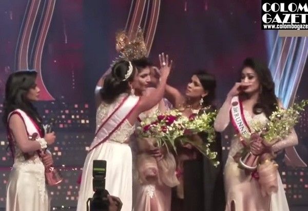 Mrs. World 2020 who snatched Mrs. Sri Lanka's crown resigns; sued for venue damages, too