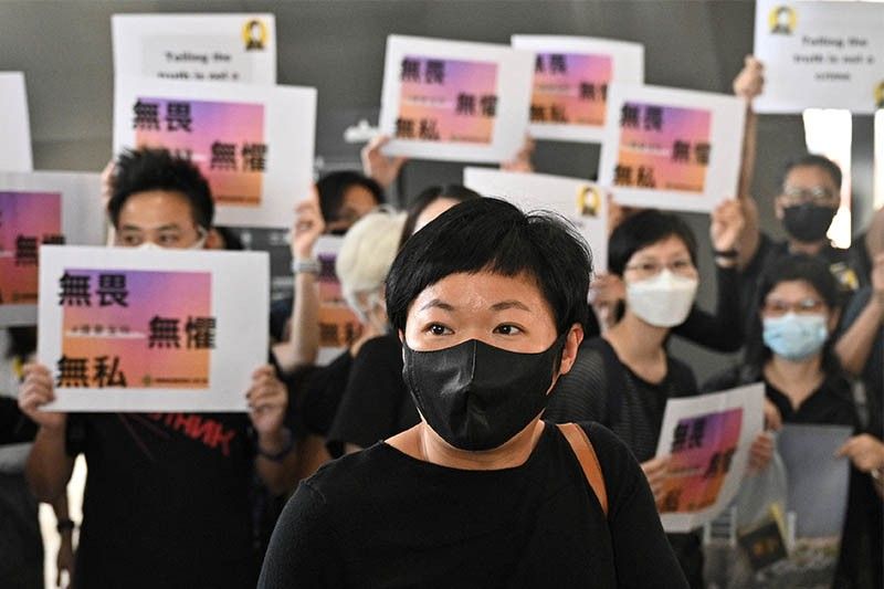 Hong Kong journalist convicted over database search for mob attack probe