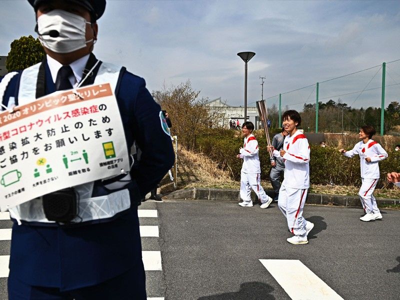 Tokyo Olympics organizers report first torch relay virus case