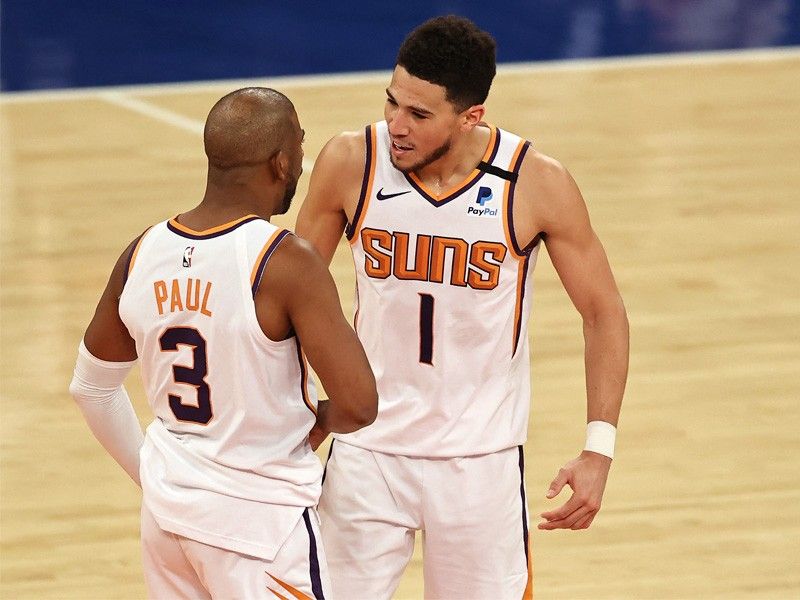 Booker, Paul shine as Suns halt Knicks win streak