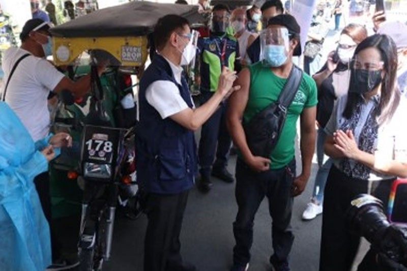 450 OFWs, trike drivers vaccinated in Quezon City