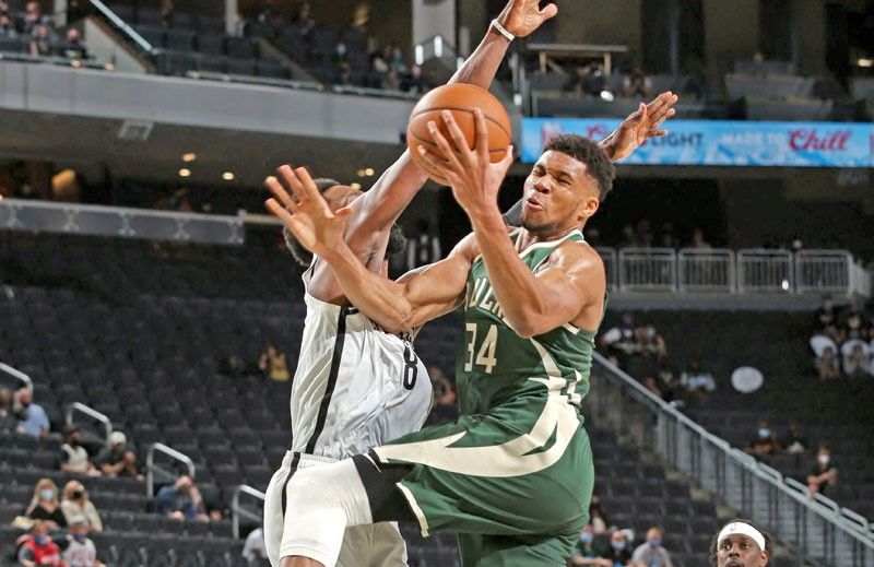 Bucks rely on Giannis, stop Nets