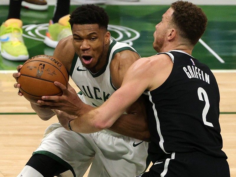 Bucks into playoffs as Giannis outguns Nets duo