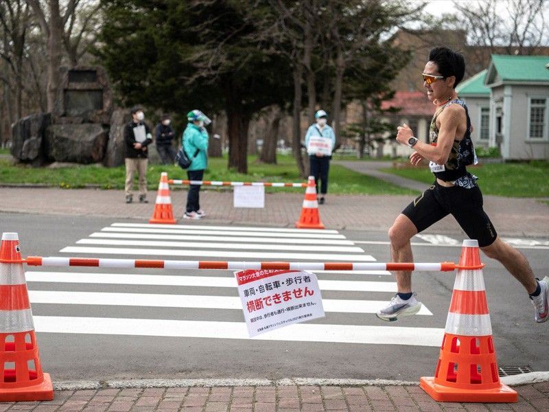 Japan to extend emergency virus measures as Olympics approach