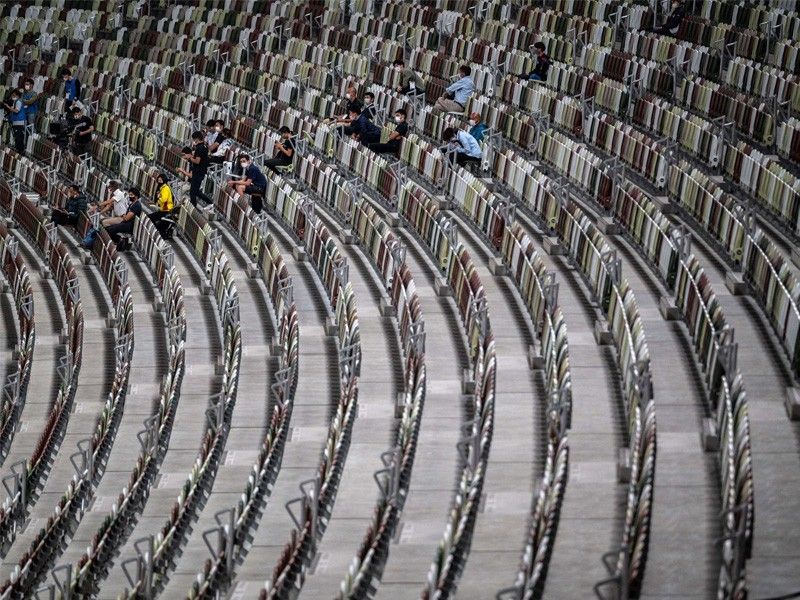 Fake cheers, empty seats: Tokyo gives glimpse of coronavirus-era Olympics