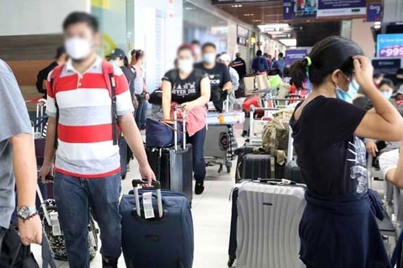 COVID-19 results ng 13 co-passenger ng 2 OFW, bineberipika na – DOH