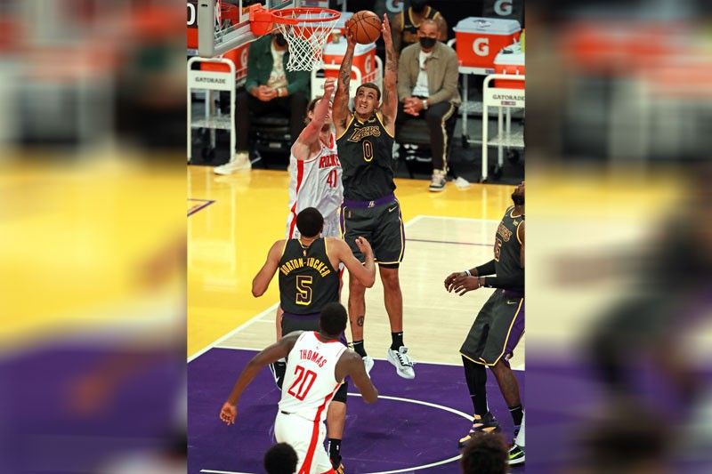 Lakers edge closer