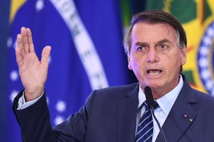 Feeling the pressure, Brazil's Bolsonaro rallies his troops