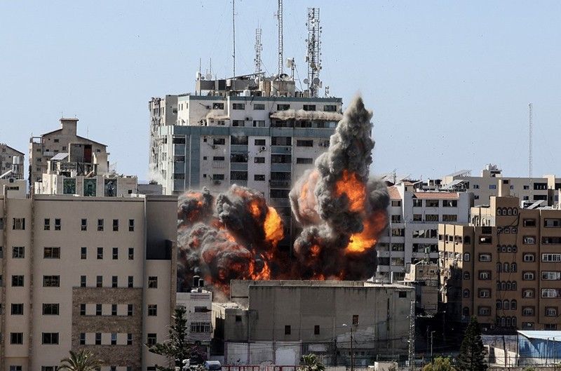 Israel flattens Gaza building hosting AP, Jazeera in air strike