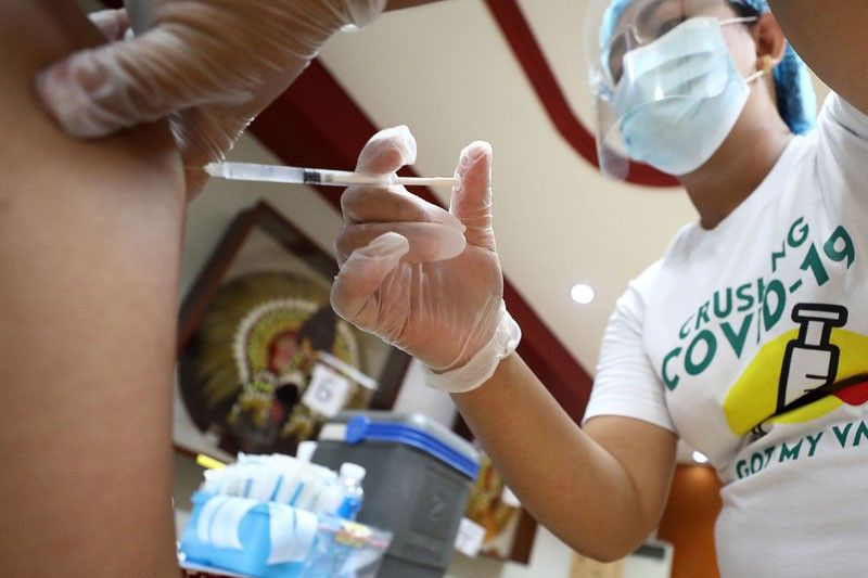 Palace defends vaccine priority for local execs