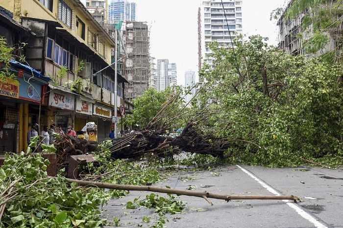 24 dead, dozens missing as cyclone batters COVID-stricken India