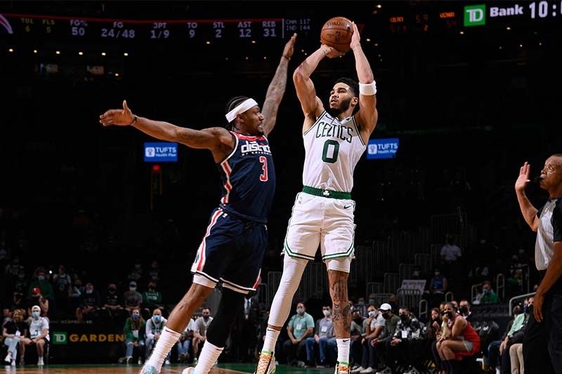 Tatum explodes for 50 points as Celtics torch Wizards to clinch 7th seed
