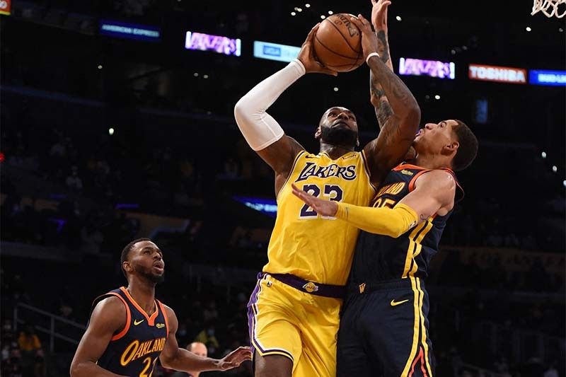 Lakers survive Warriors to clinch 7th seed in NBA playoffs