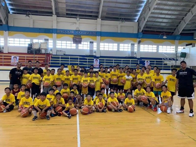 Former UST cager June Dizon runs own basketball camp in Cavite