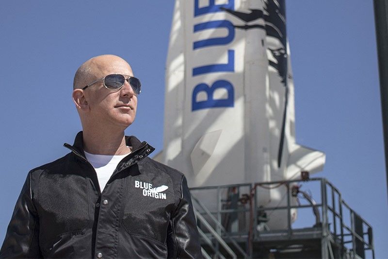 Trip to space with Jeff Bezos sells for $28 million