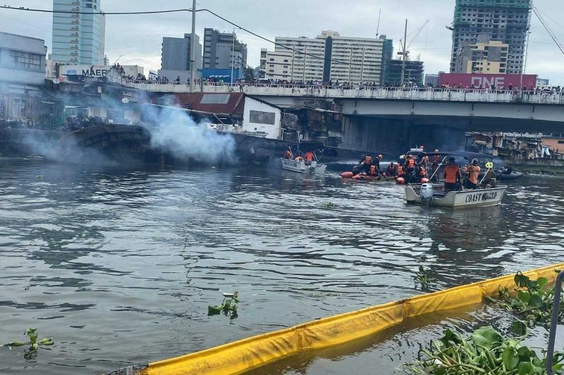 PCG conducts water sampling after cargo vessel burns in Tondo