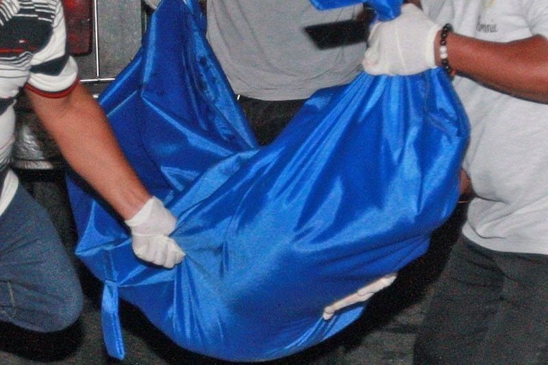 Body found near burned cargo ship