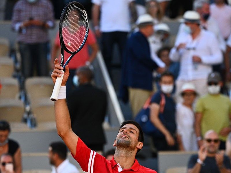 Djokovic gives match-winning racquet to boy 'with right tactics'