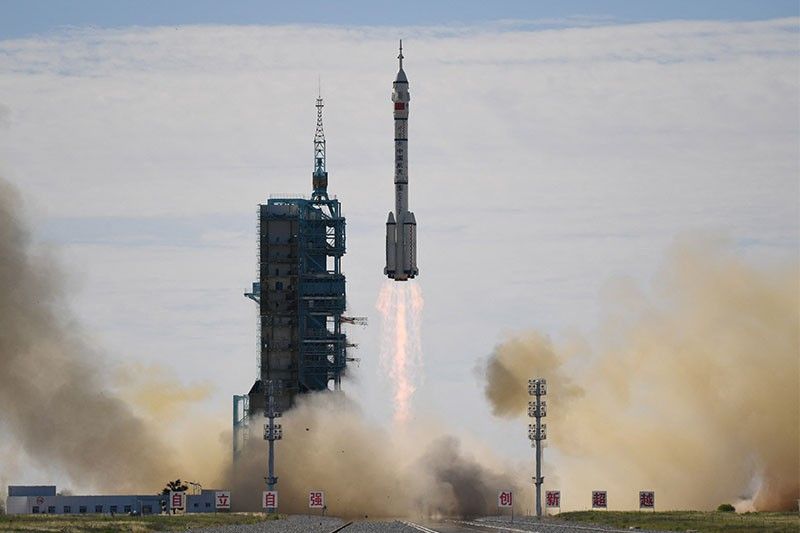 Chinese astronauts complete three-month space mission