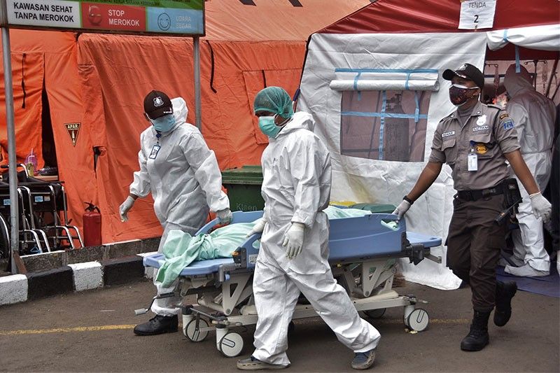 Indonesia to impose emergency curbs to battle virus surge