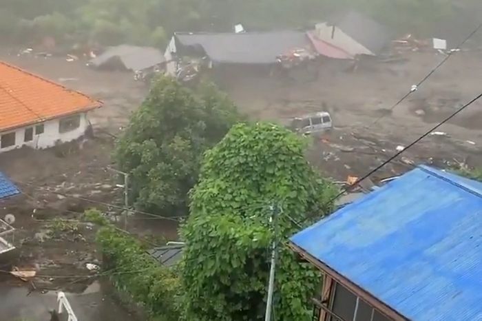 19 missing in Japan landslide after heavy rain: official