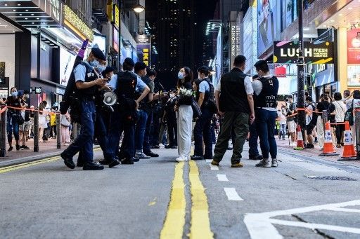 Hong Kong police warn residents against mourning man who stabbed officer