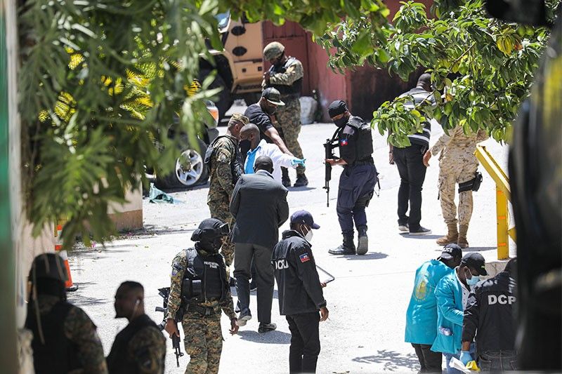Haiti police hunt down president's assassins as uncertainty grows