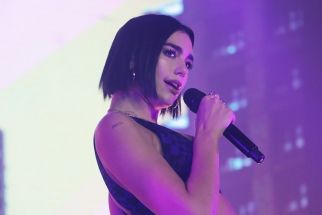 In this Sept. 14, 2018 photo, Dua Lipa performs before thousands of her Filipino fans at the Mall of Asia Arena.