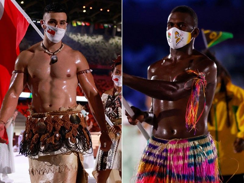 Topless Tongan faces ripped rival at Olympic opener