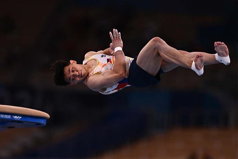 Yulo averts total Olympic disaster, makes it to vault finals