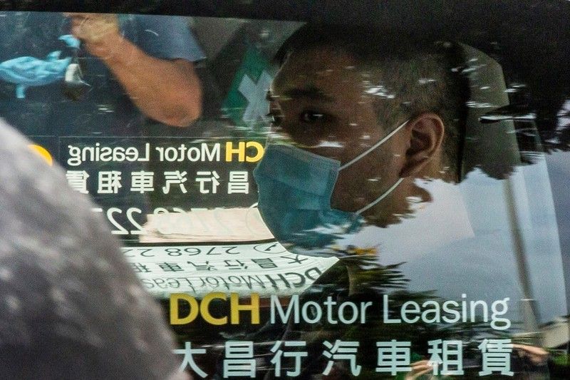Hong Kong court convicts man in first national security trial