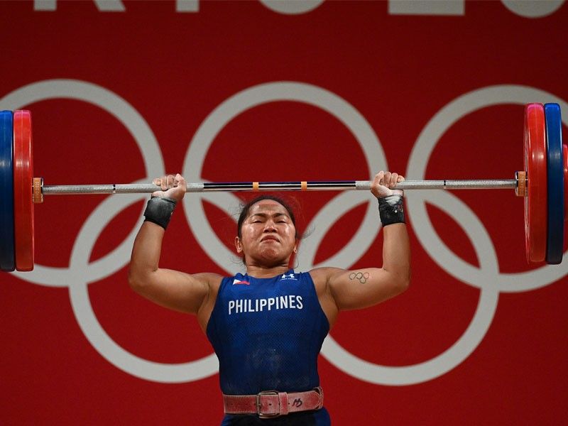 God Helped Hidilyn Diaz Pull Off Record Setting Golden Olympic Lift Philstar Com