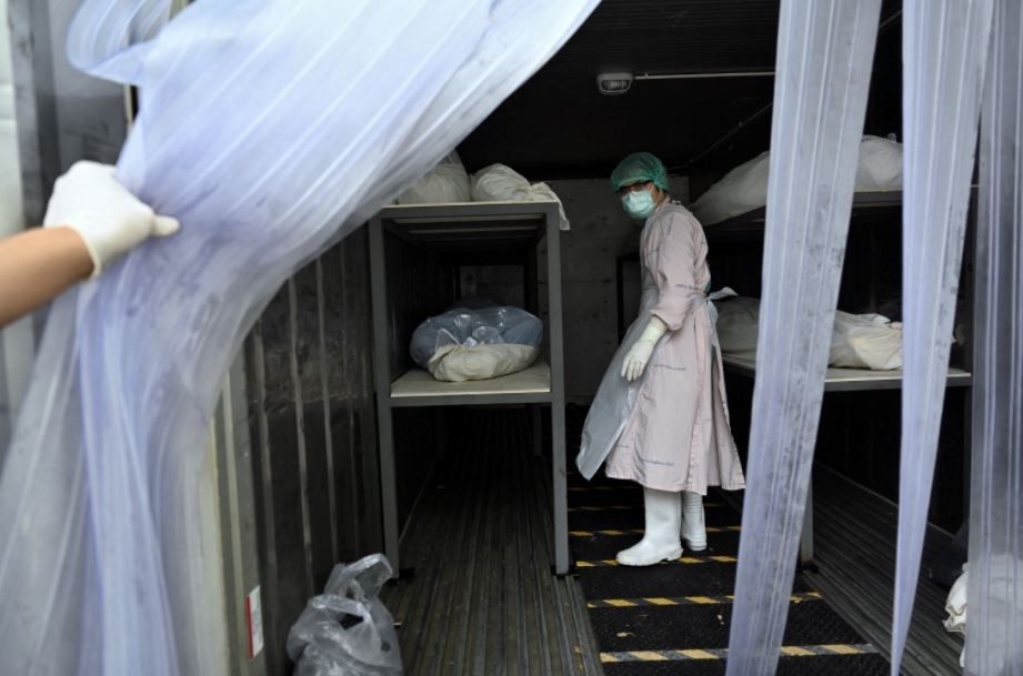 Grim toil for morgue workers as Thai virus cases rise