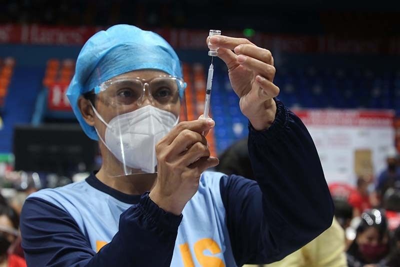 10M fully vaccinated before Metro Manila reverts to ECQ â�� Palace