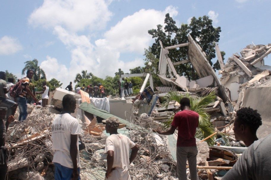 Death toll in massive Haiti quake jumps to over 1,200