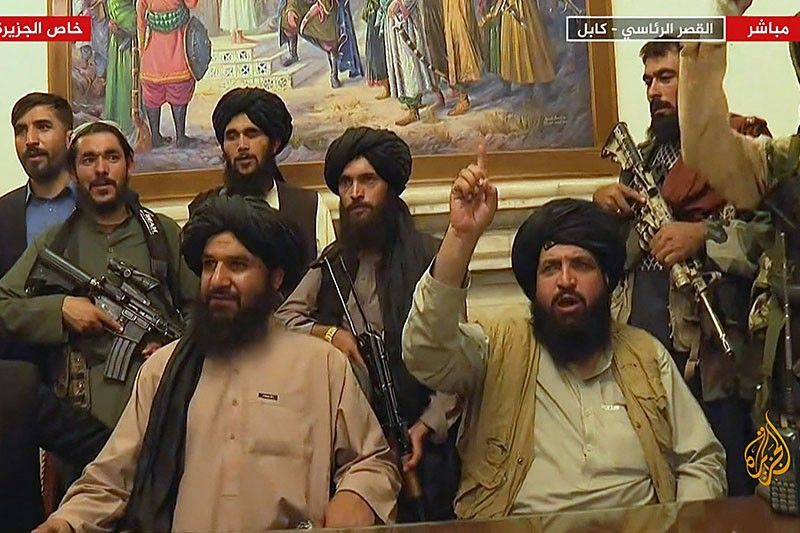 Taliban say won't seek 'revenge', co-founder back in Afghanistan