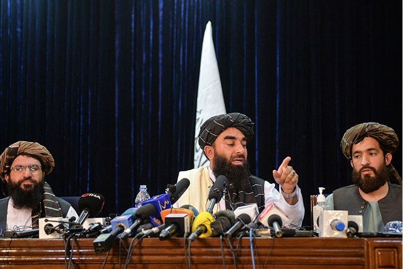 Taliban hold political talks, Biden says 'chaos' was inevitable