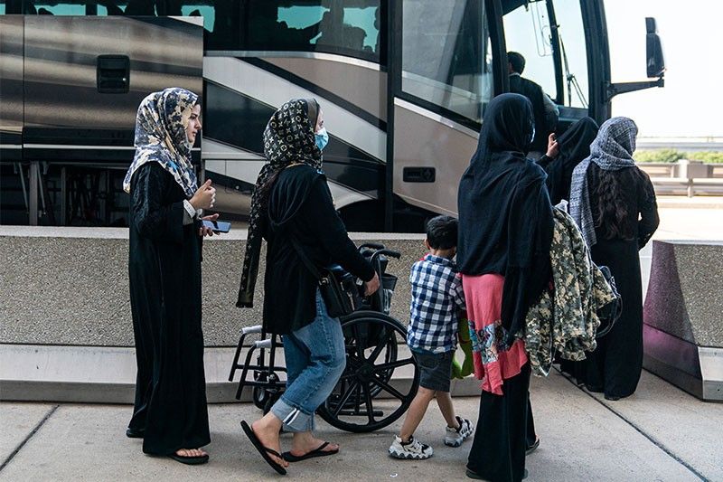 'Please let us on the bus': Heartbreak on Kabul airport convoy