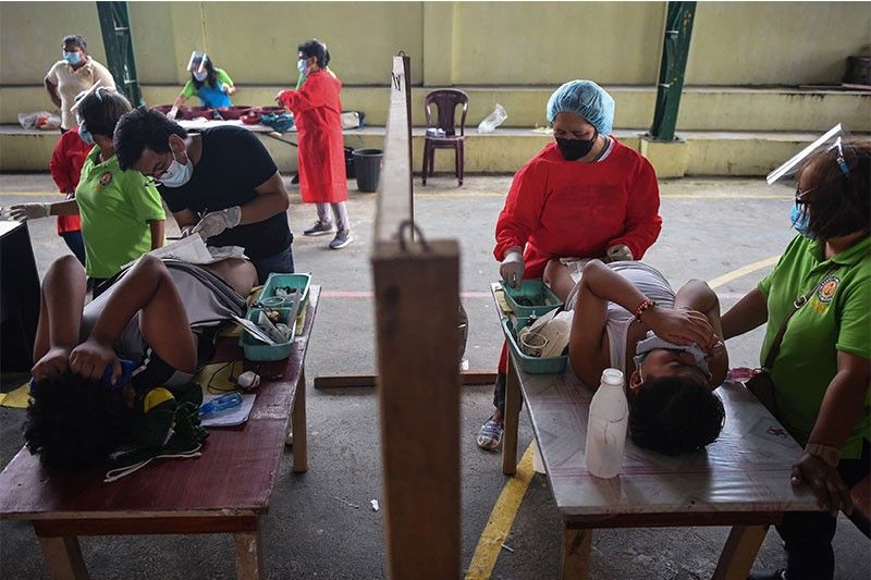 Philippine 'circumcision season' underway after virus delays