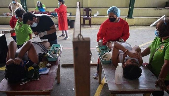 Philippine 'circumcision season' underway after virus delays