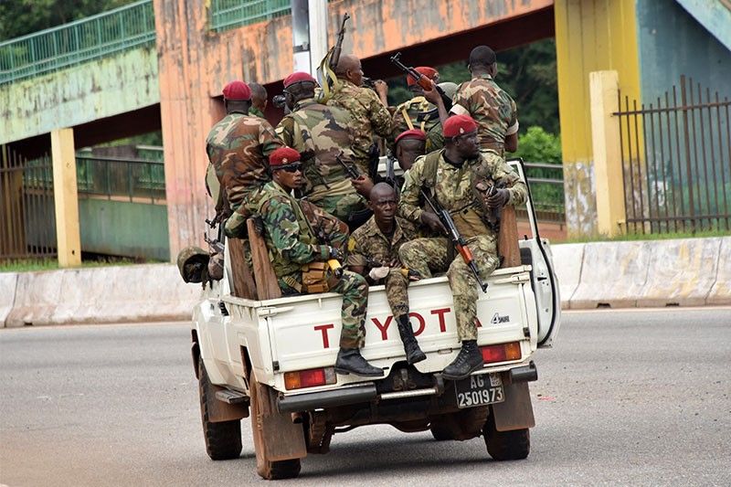 Army seizes power in Guinea, holds president