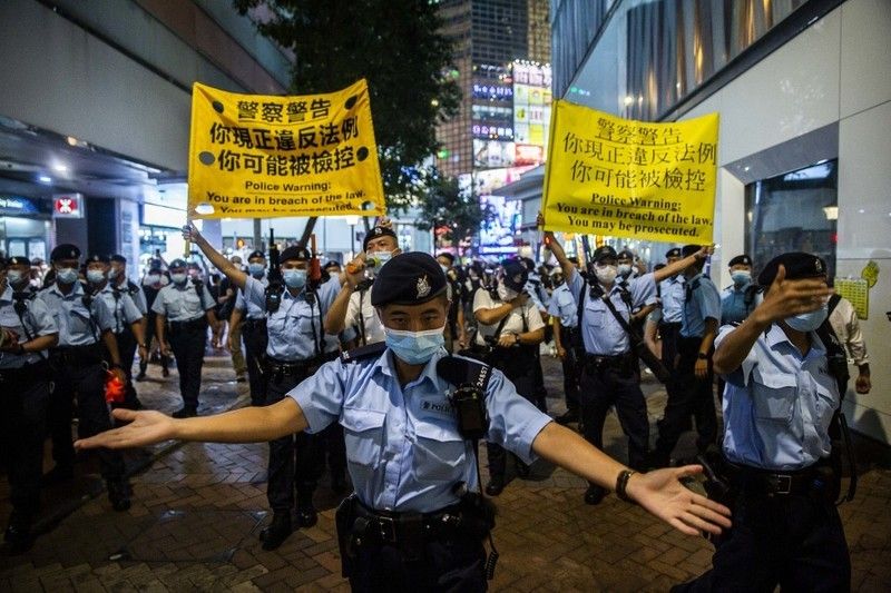 Hong Kong police arrest Tiananmen vigil organizers