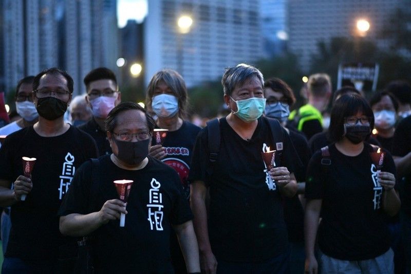 9 Hong Kong activists given jail terms for joining Tiananmen vigil