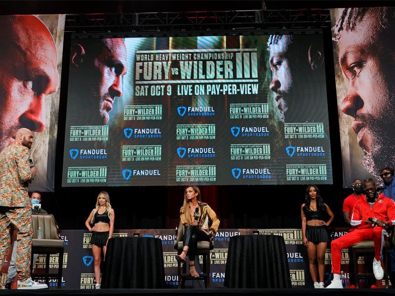 Fury, Wilder kept apart after sparks fly at press conference