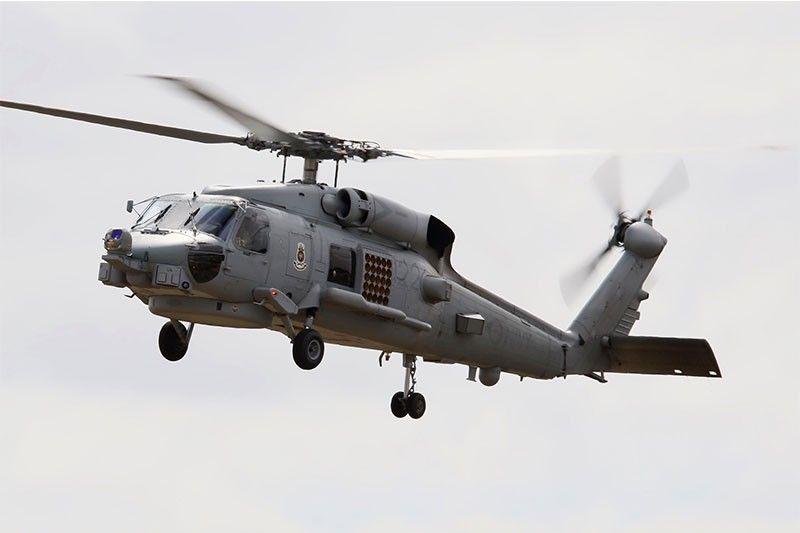 3 crew members safe after Australian military chopper crashes in Philippine Sea