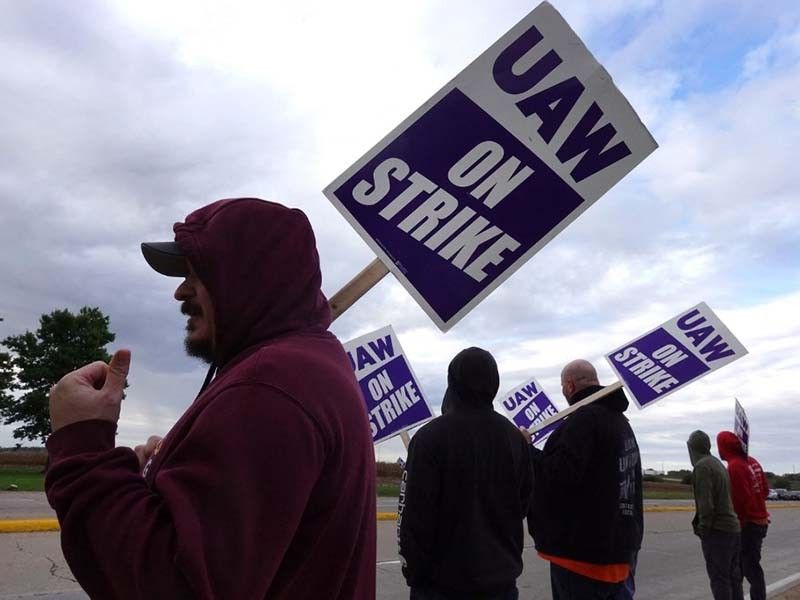 Frustrated and weary over long pandemic hours, more US workers are striking